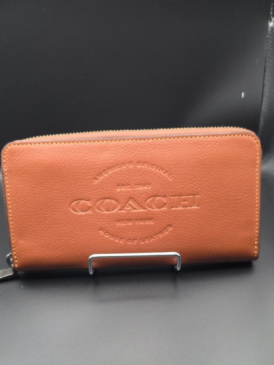 Coach Handbags - Coach Embossed Leather Zip Wallet in Tan Brown